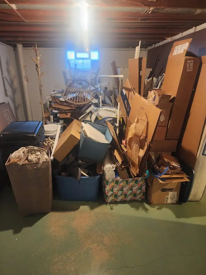 Roll-off dumpster container at job site for Yard Waste Dumpster Rental in Fawn